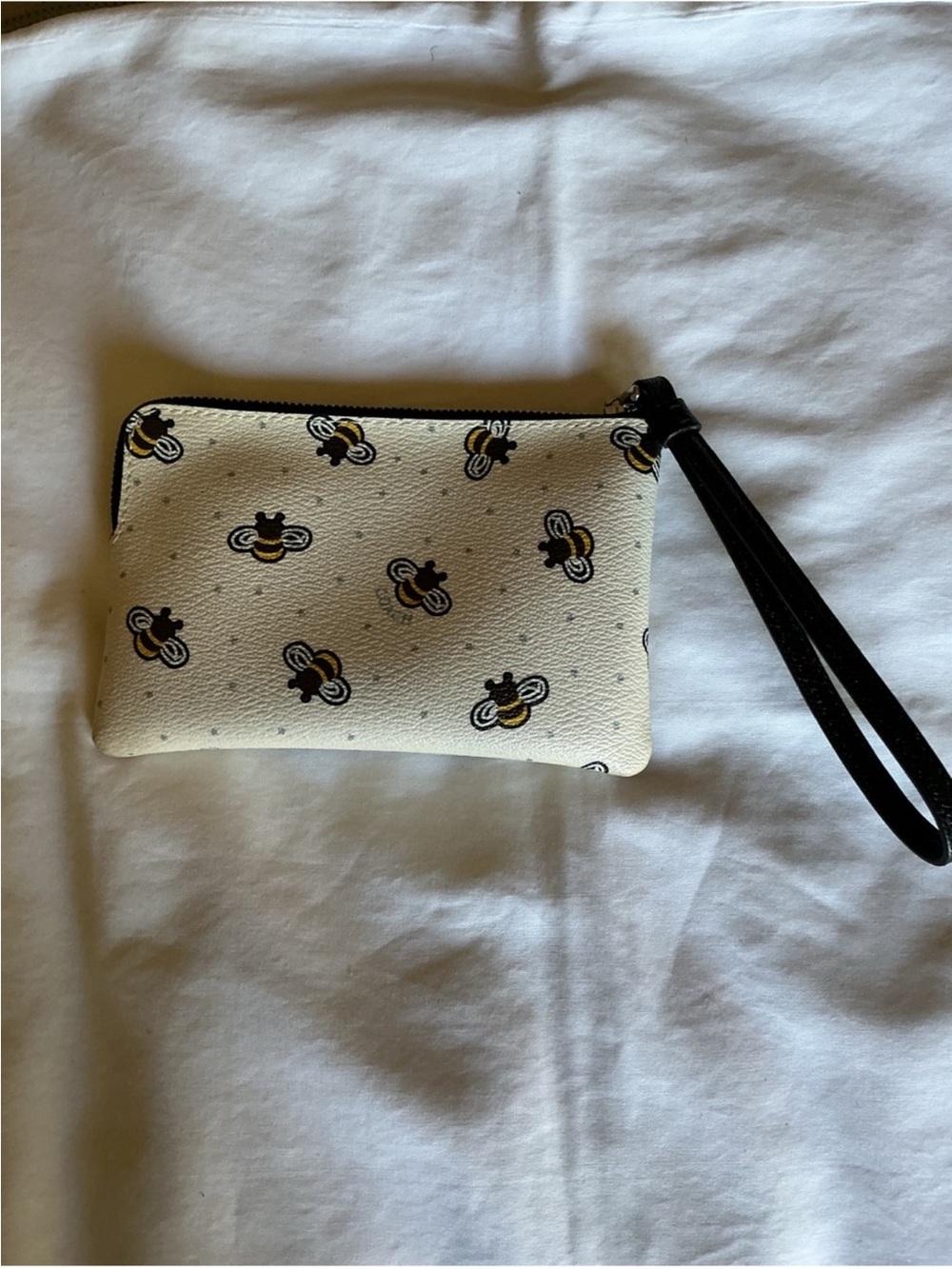 Coach Cream Bee Print Wristlet with Black Strap